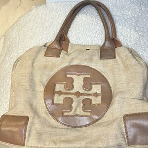 Tory Burch canvas neutral color with brown leather handles and trim !